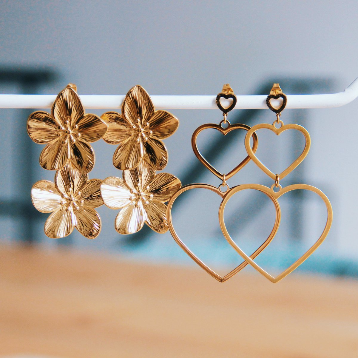 RVS statement oorbel 2 bloemen - goud